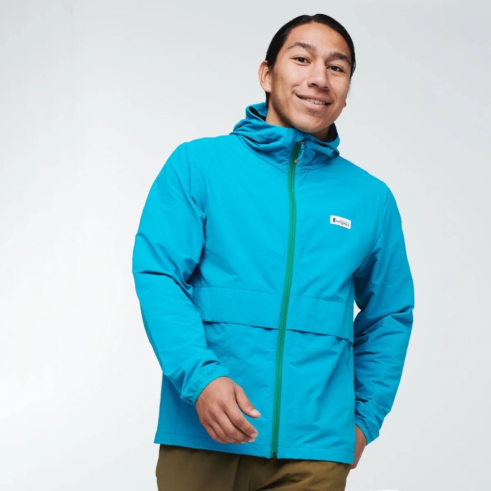 Cotopaxi viento men’s travel jacket in turquoise- windbreaker